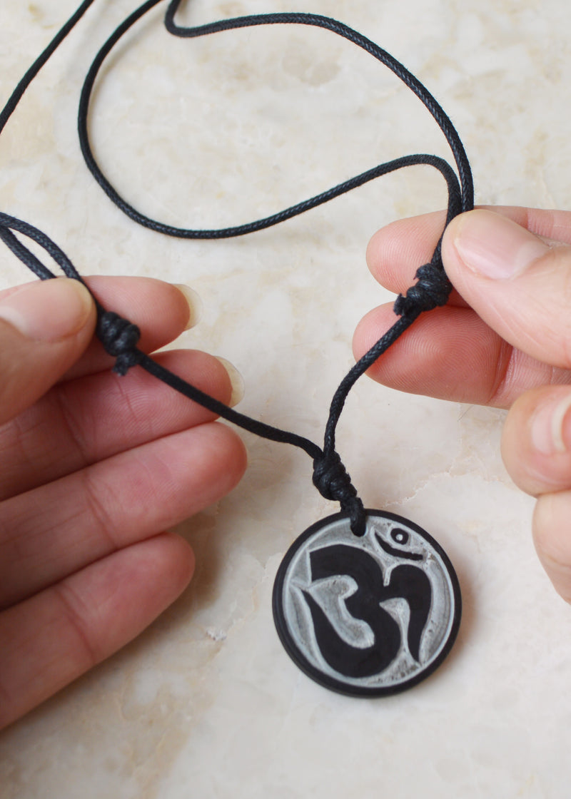 Om Carved Stone Necklace