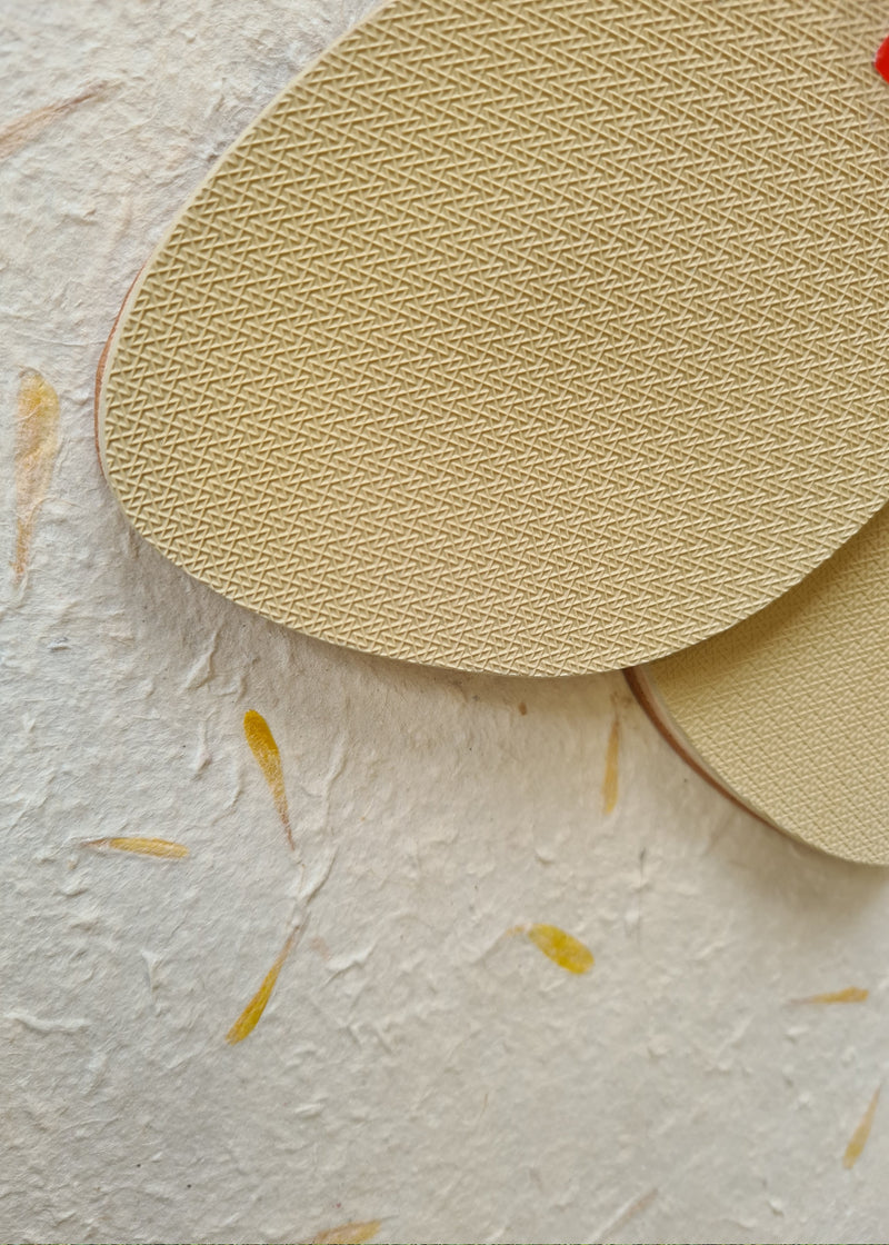 close up of the sole of handmade lace up sandals